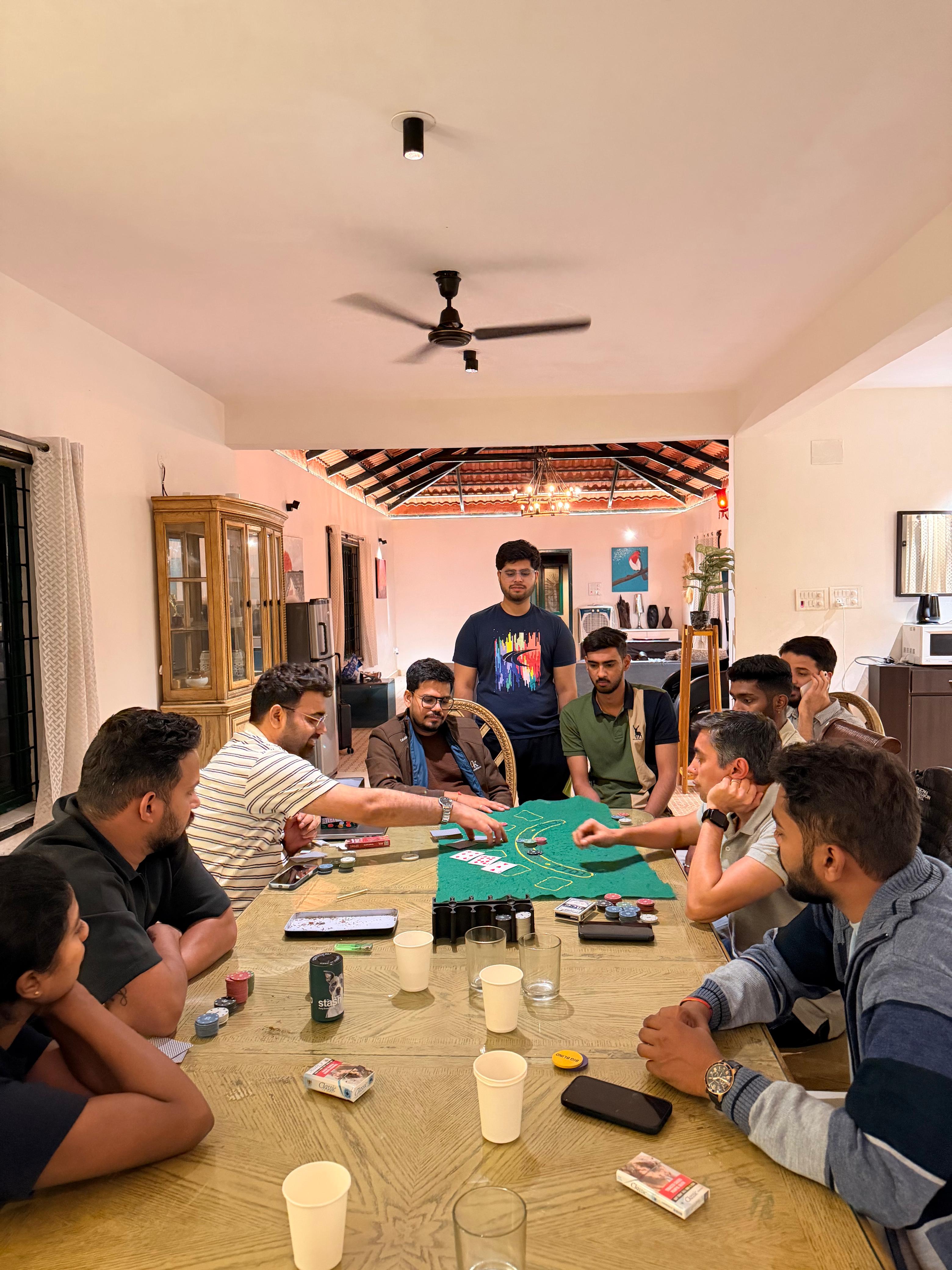 Trivas team playing poker during an offsite