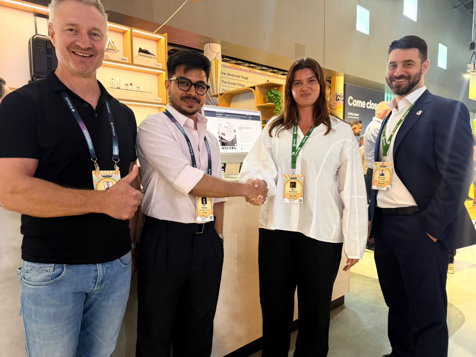 Trivas team shaking hands with the Shopify account team